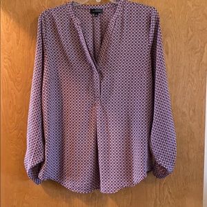 Maroon and white blouse.